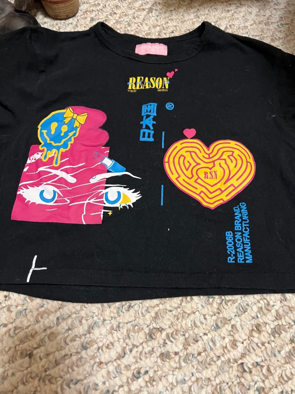 Reason Black Tee with Pink, Yellow & Blue Graphic Heart